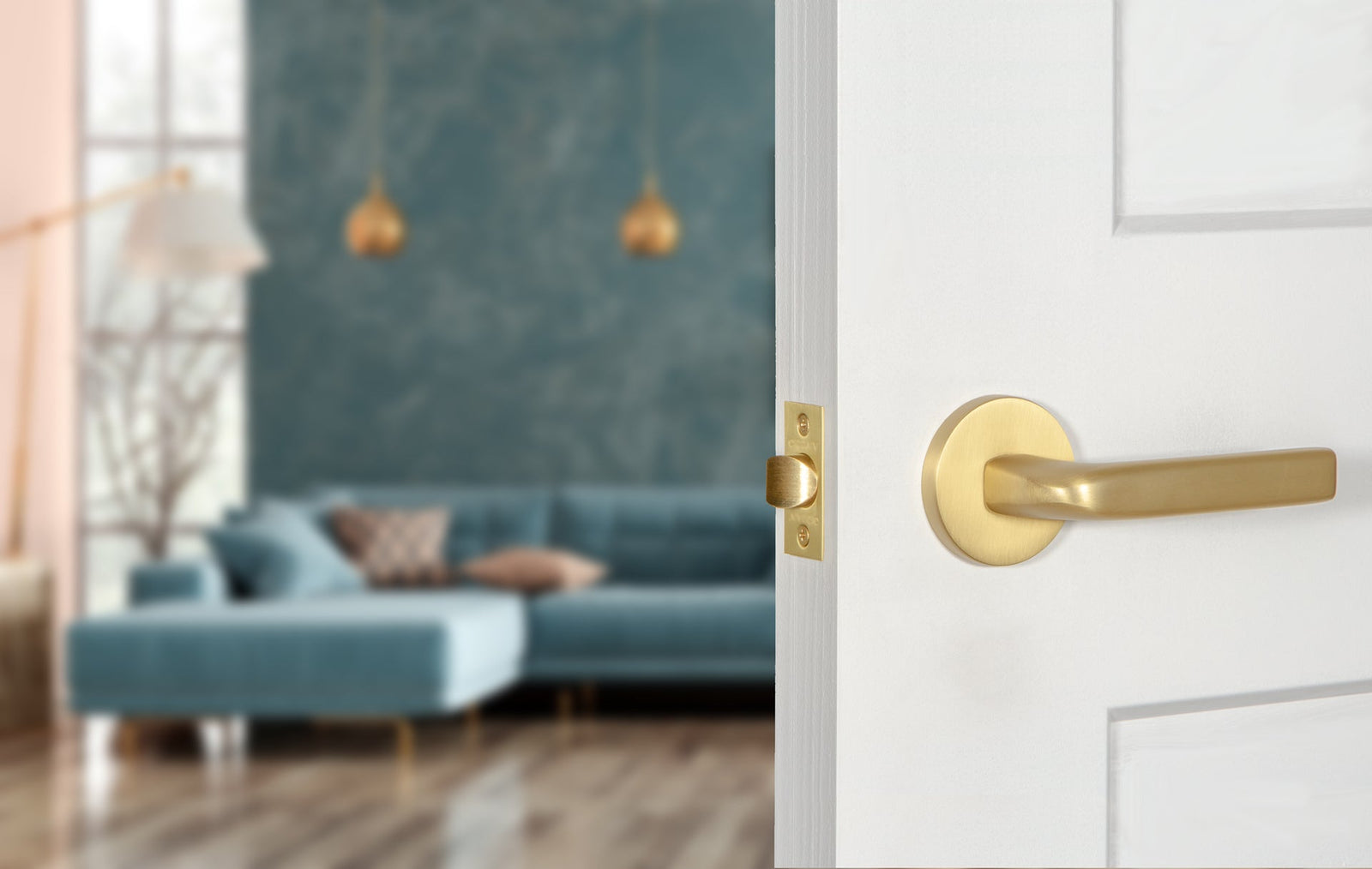 white door with modern contemporary door hardware with lever satin brass teal room