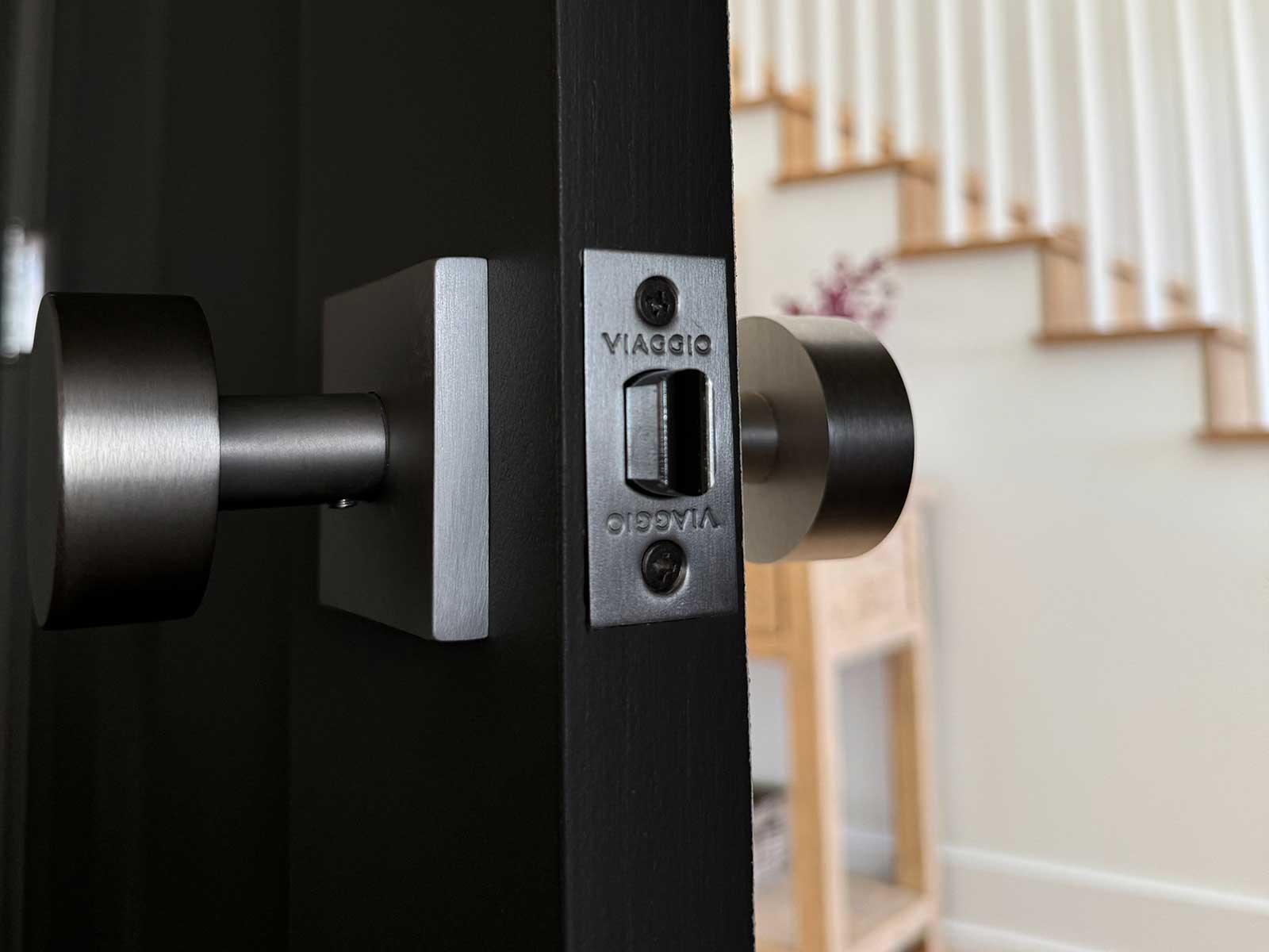 modern wood door with satin nickel hardware from viaggio