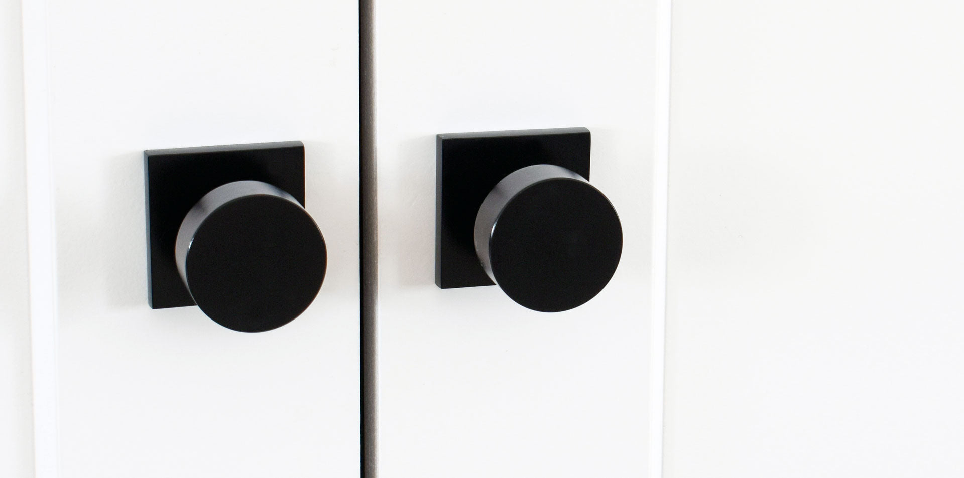 white french closet doors with black modern contemporary door hardware from viaggio