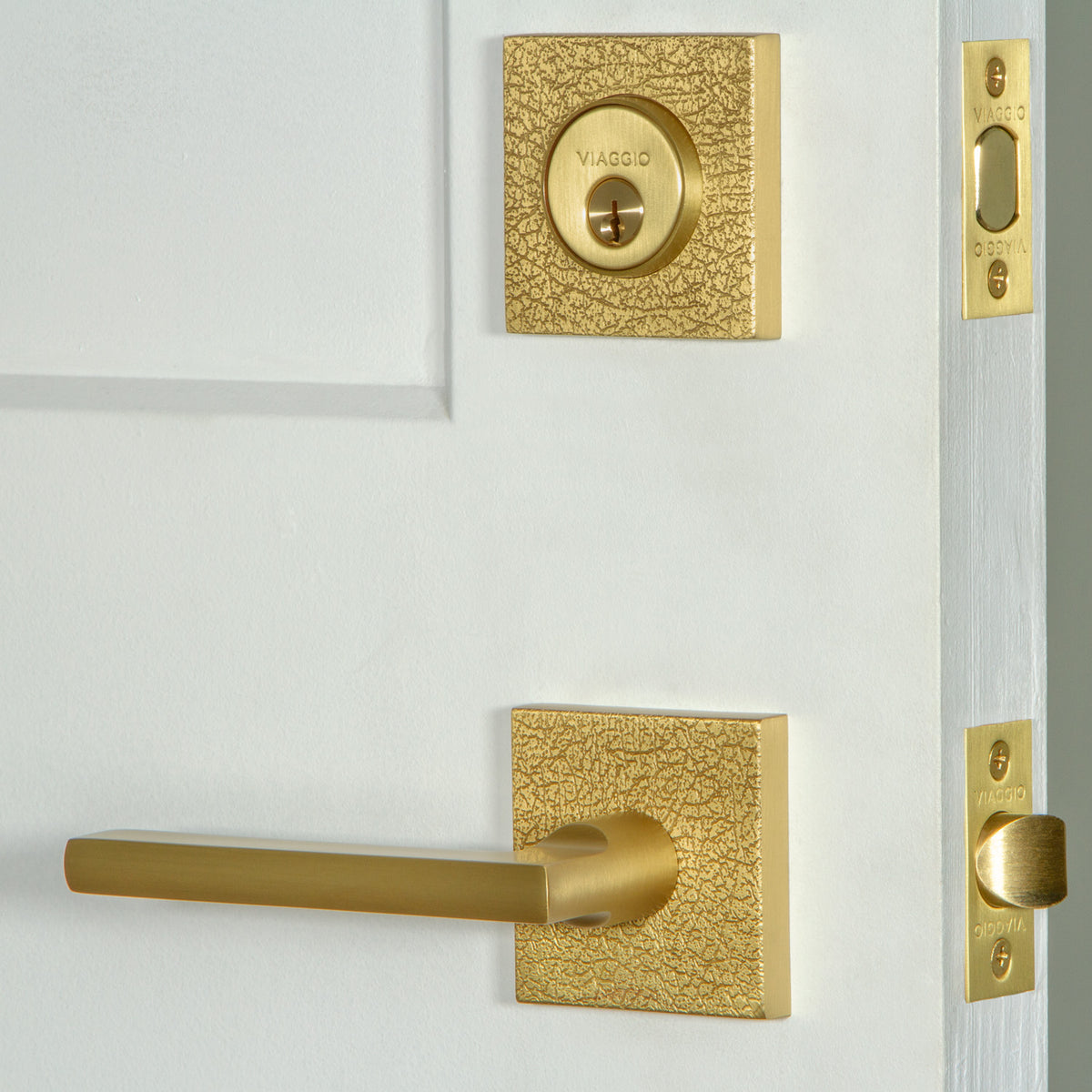 Quadrato Leather Rosette Entry Set with Milano Lever in Satin Brass